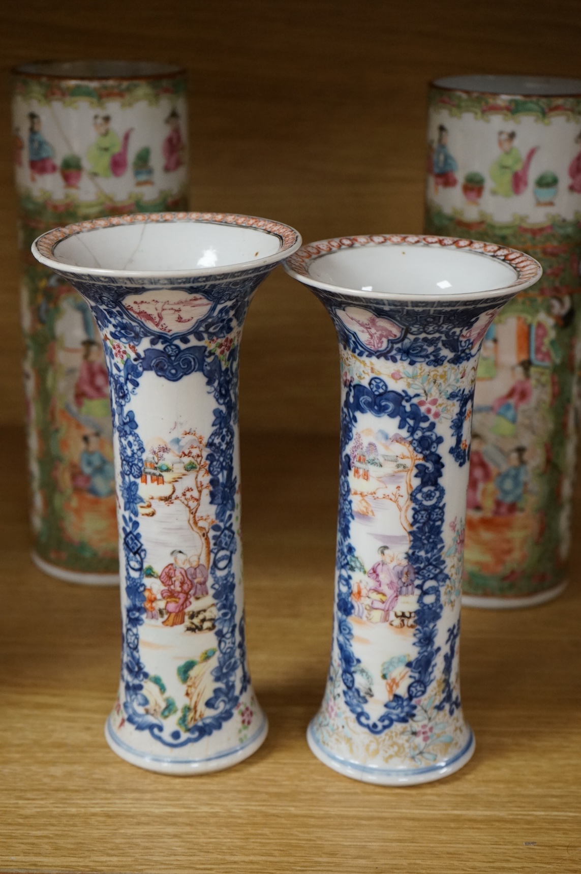 A pair of 18th century Chinese famille rose sleeve vases, a pair of 19th century Canton pattern vases and two English spill vases (6), tallest 25cm